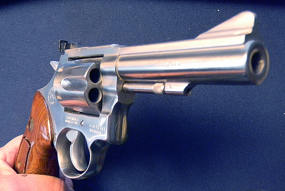 is a very fine and nearmint stainless .38 Special revolver